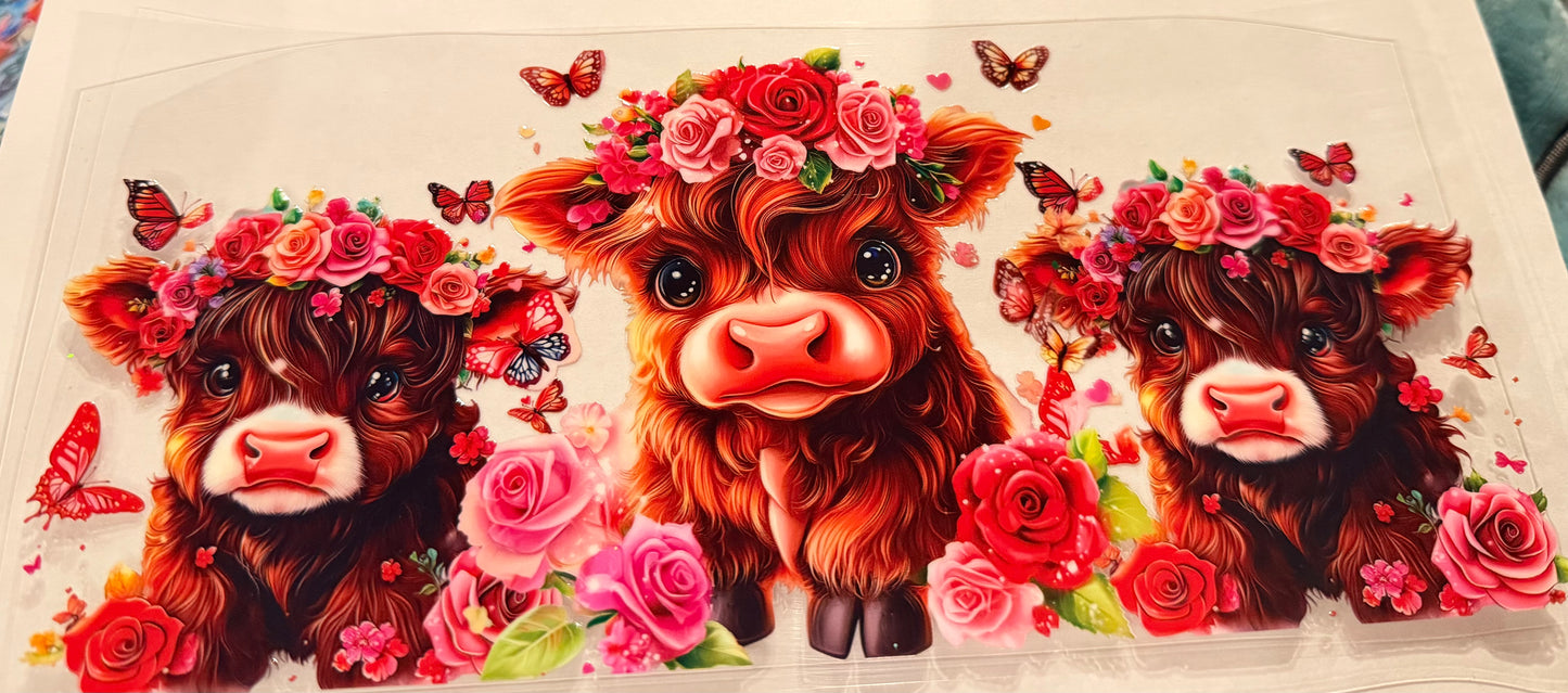 Cows, pink flowers 