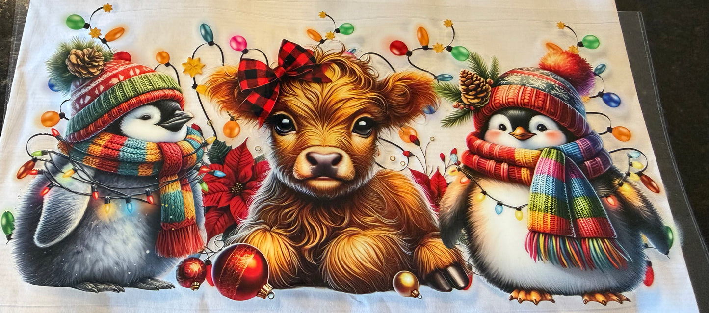 Christmas cow and penguins