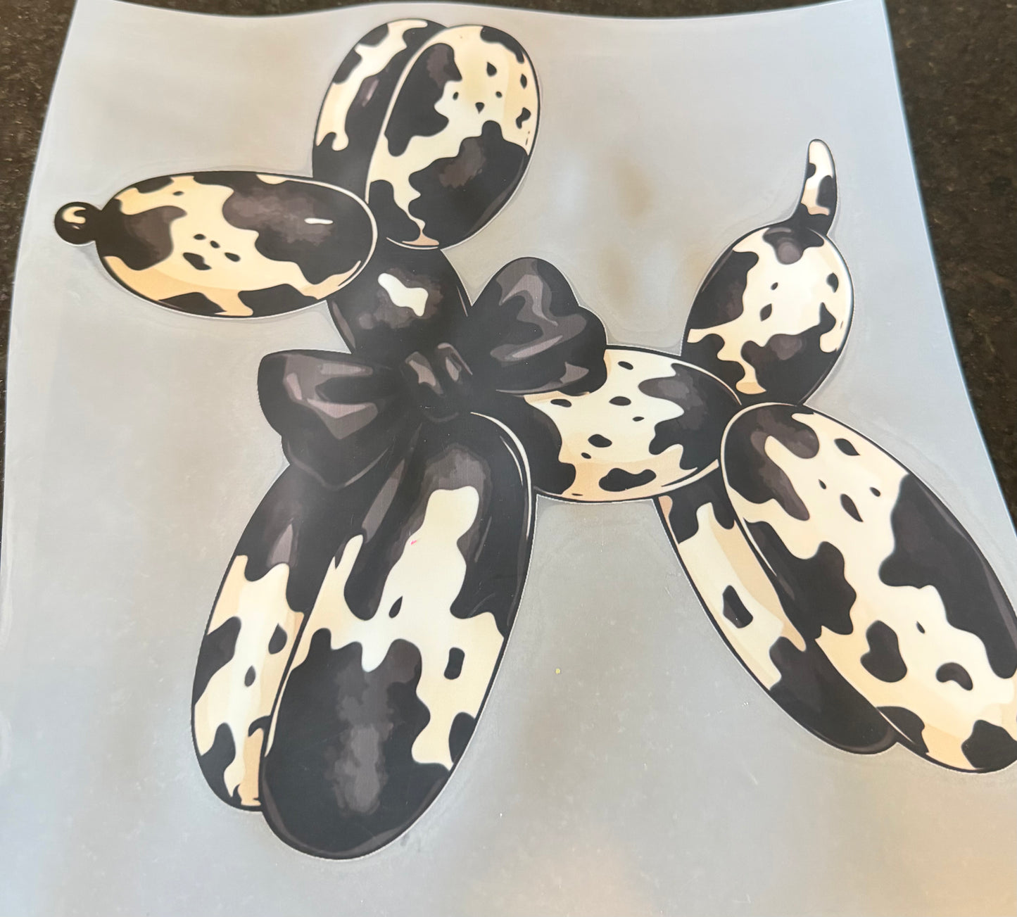 Cow print balloon dog
