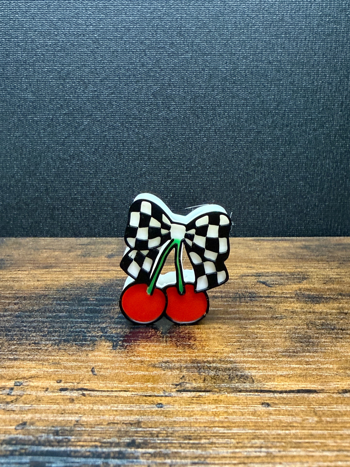 Checkered bow and cherry topper