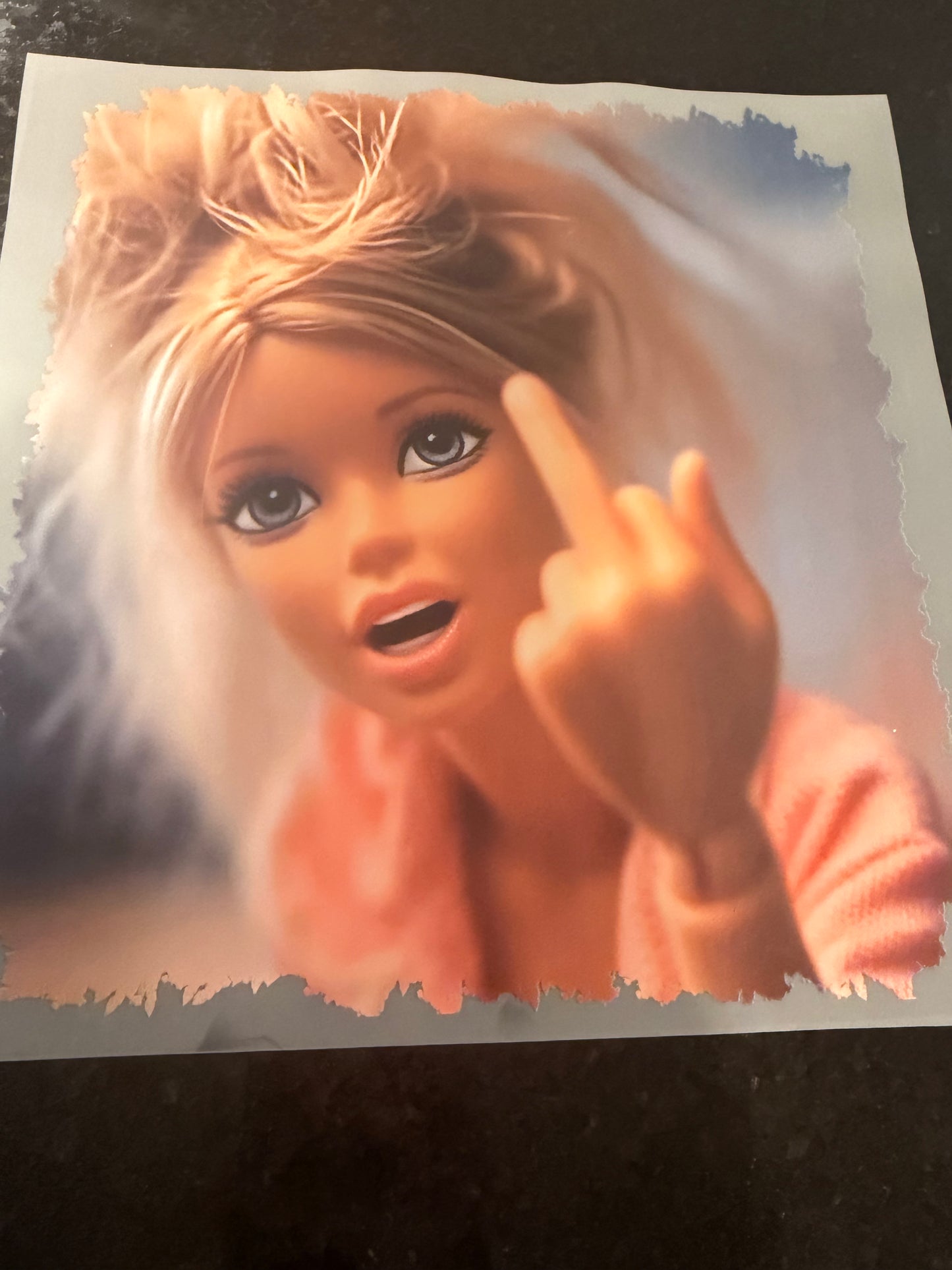 Blonde Barbie with finger