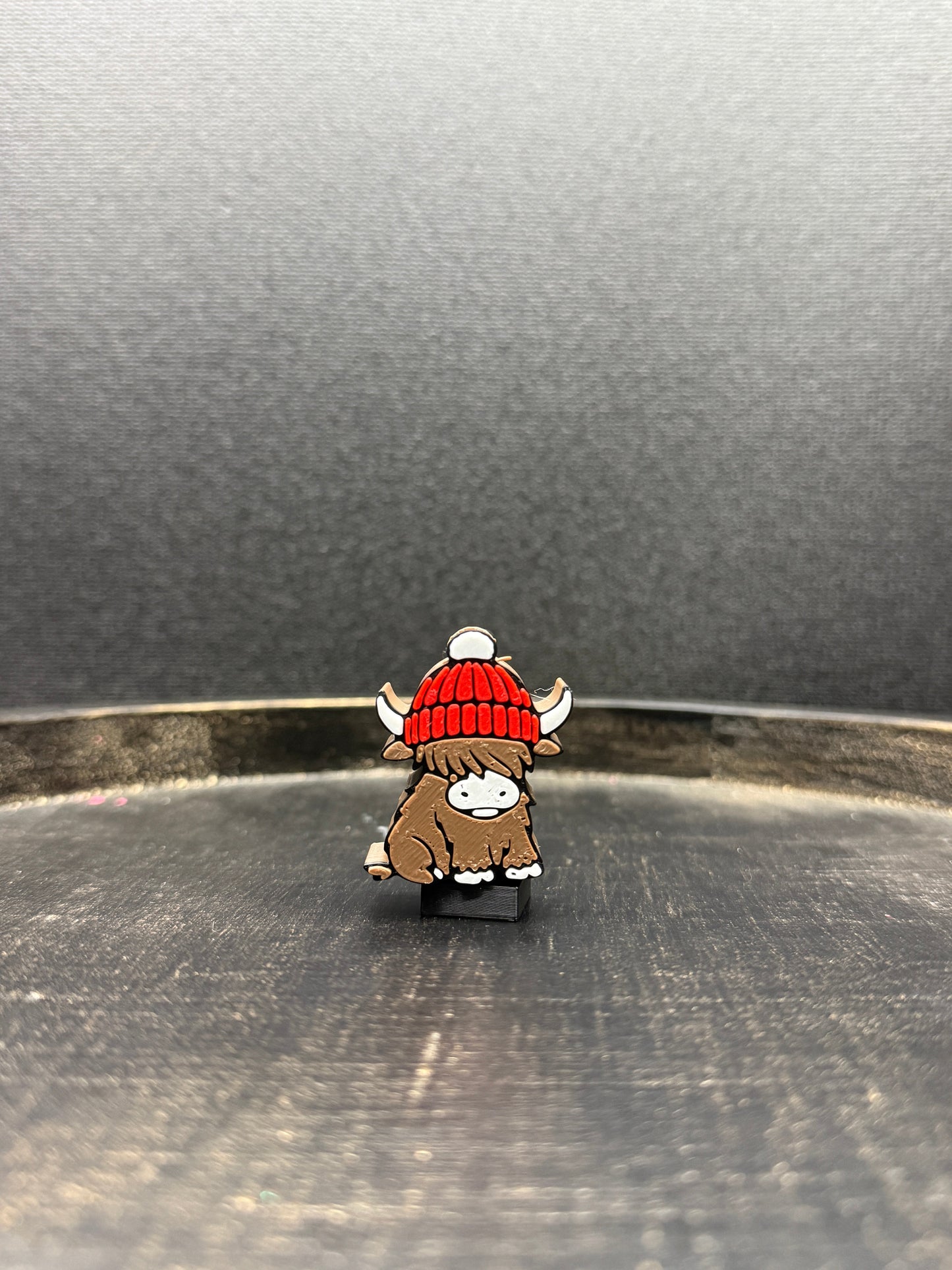 Highland Cow with Red Beanie Topper