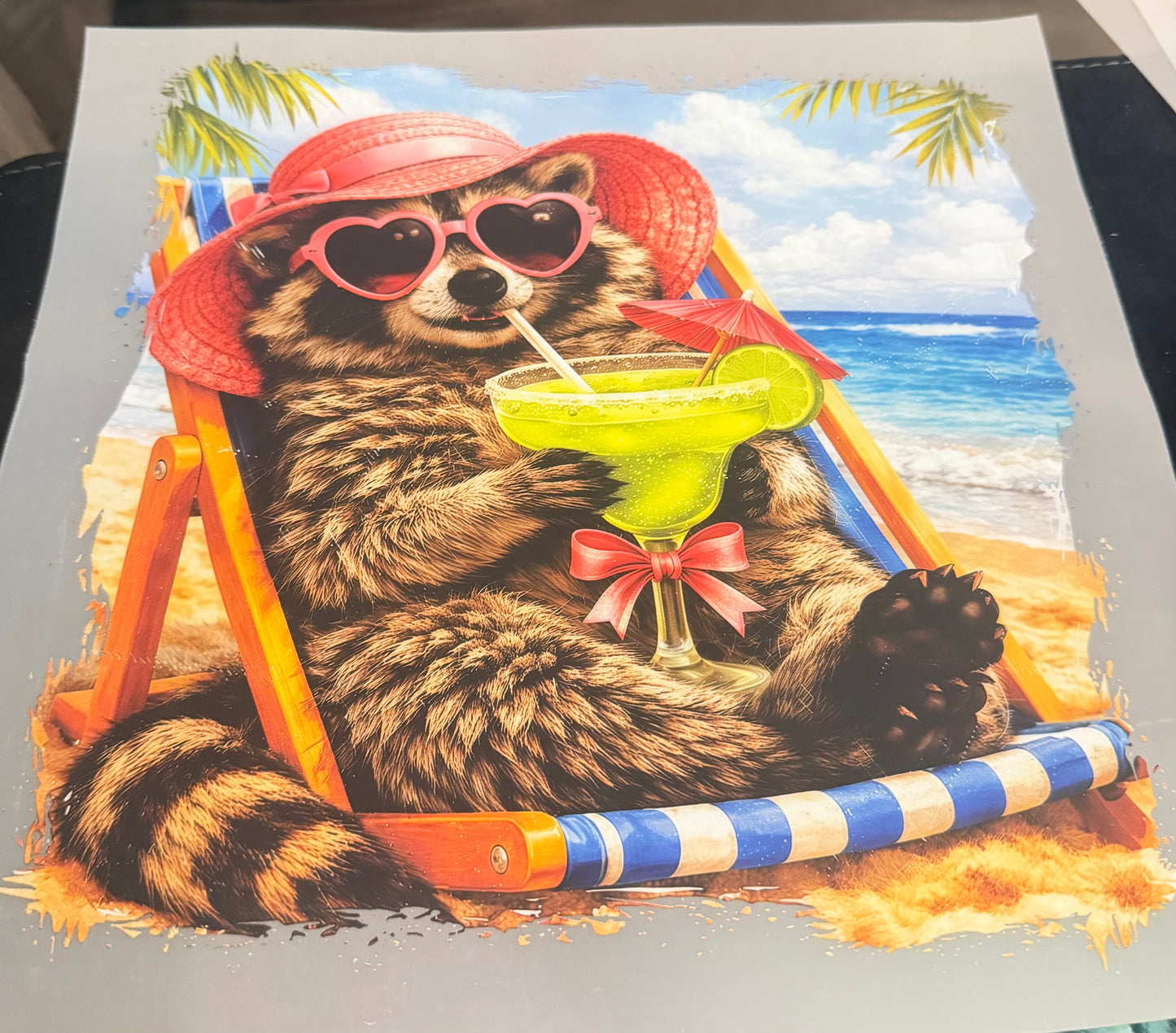 Raccoon sipping marg