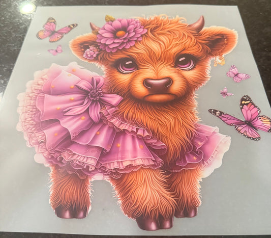 Cow with purple tutu and butterfly
