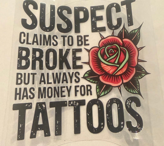 Suspect claims to be broke but always has money for tattoos