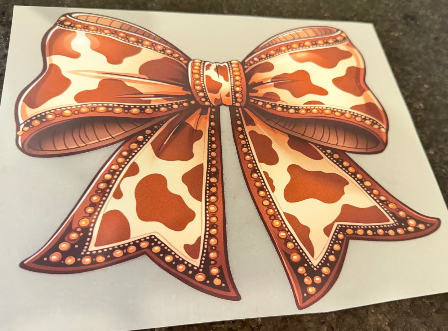 Brown cow print bow