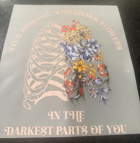 Find someone who grows flowers in the darkest part of you