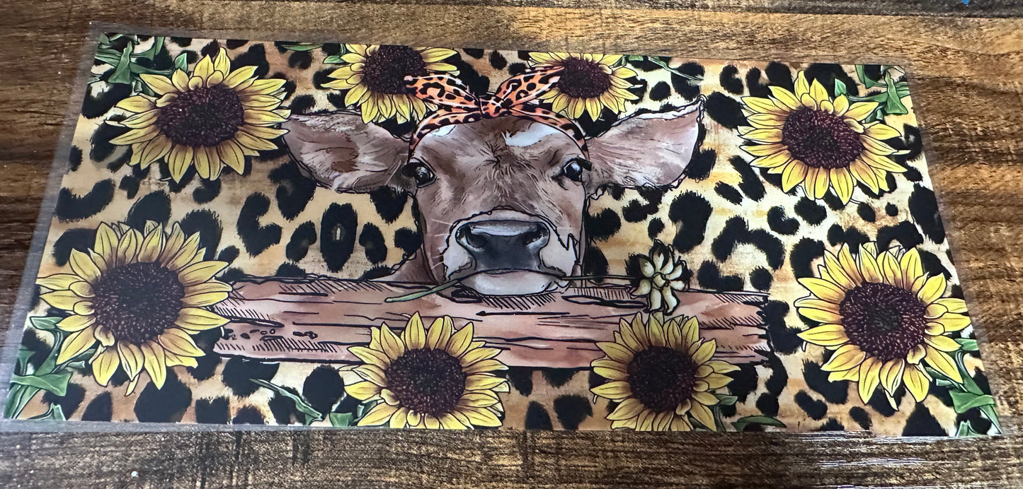 Sunflowers and cow