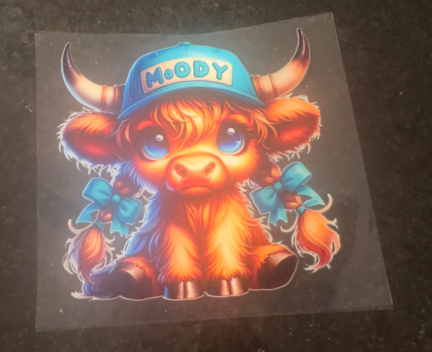 Moody cow decal