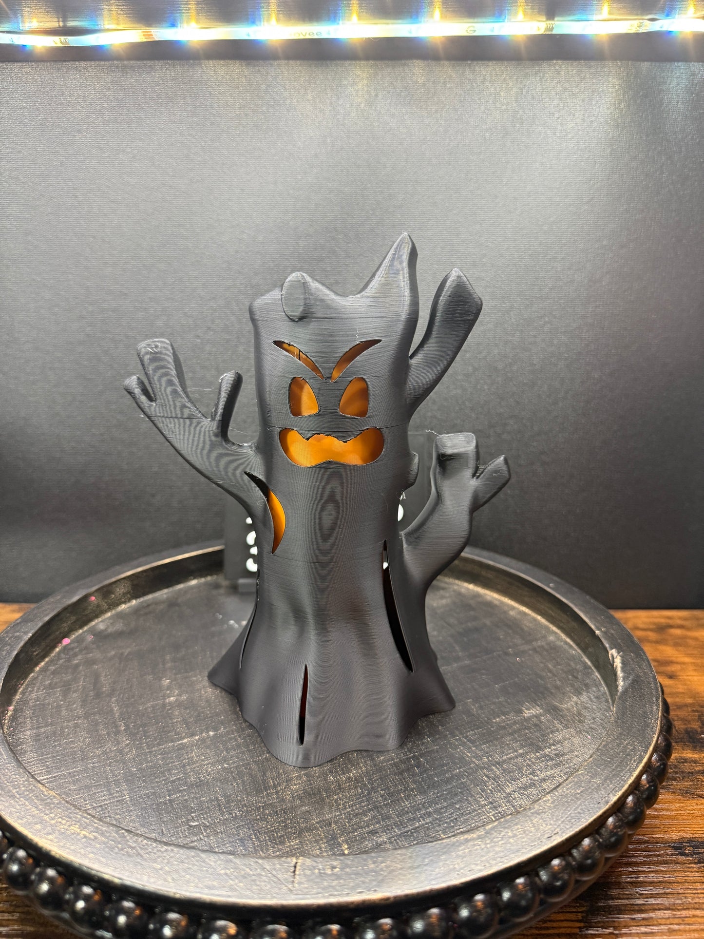 Spooky tree with LED candle