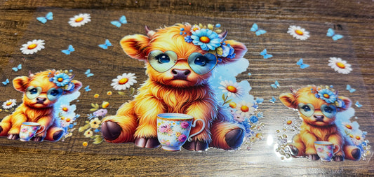 Cow with tea cup and heart glasses