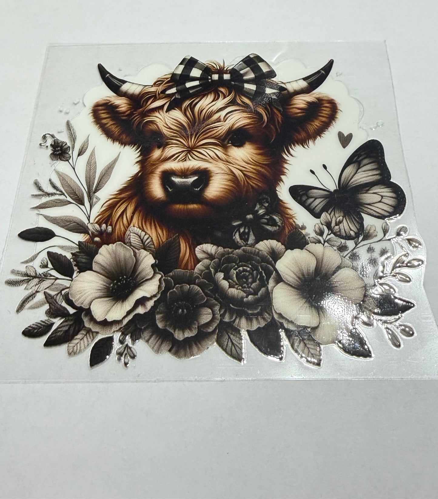 Cow with flowers and butterflies